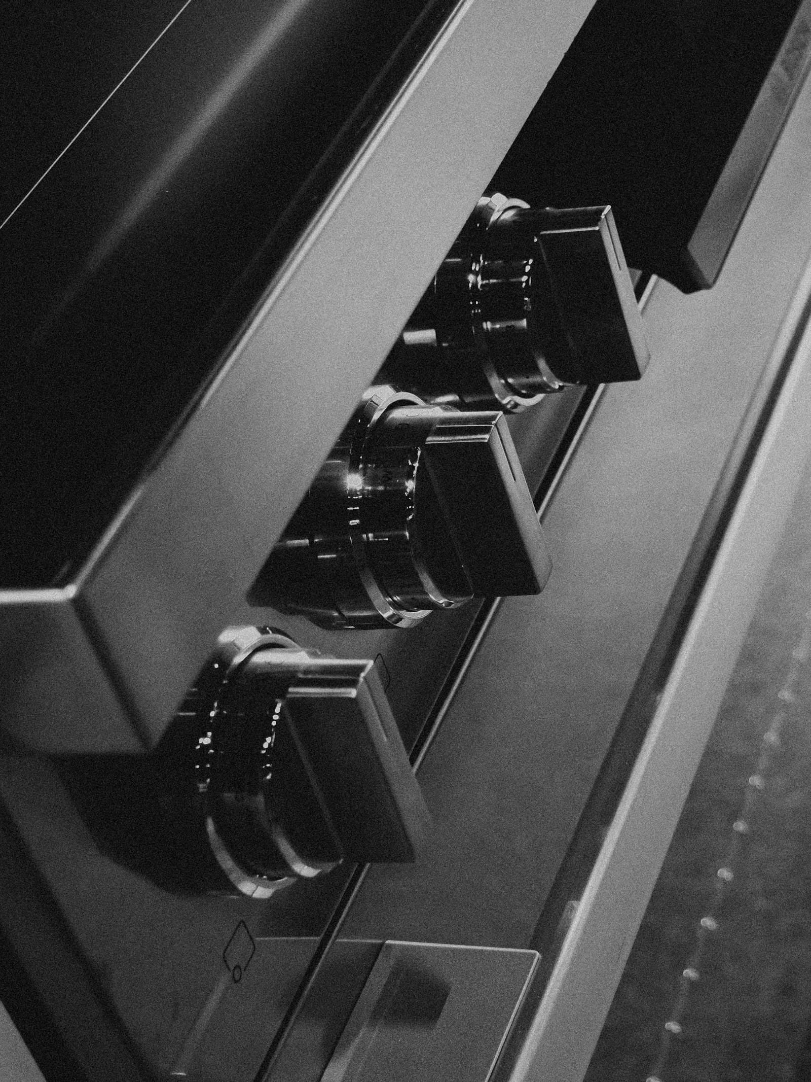 Close-up of stainless steel range control knobs